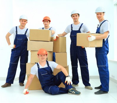 Professional movers handling office equipment in Shoreditch
