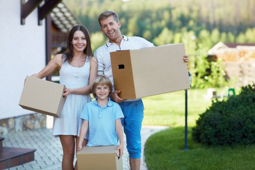 Professional removalists packing a house