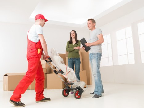 Professional team handling furniture pickup in Shoreditch storage